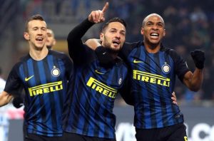 Inter's Danilo D'Ambrosio (C) jubilates with his teammates Ivan Perisic and Joao Mario (R) after scoring the goal during the Italian Serie A soccer match Inter FC vs Pescara Calcio at Giuseppe Meazza stadium in Milan, Italy, 28 January 2016. ANSA/MATTEO BAZZI
